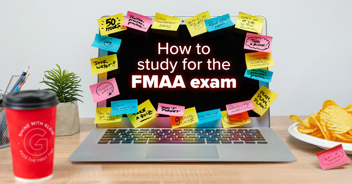 Laptop screen with edges covered in sticky notes. The screen reads "How to study for the FMAA exam."